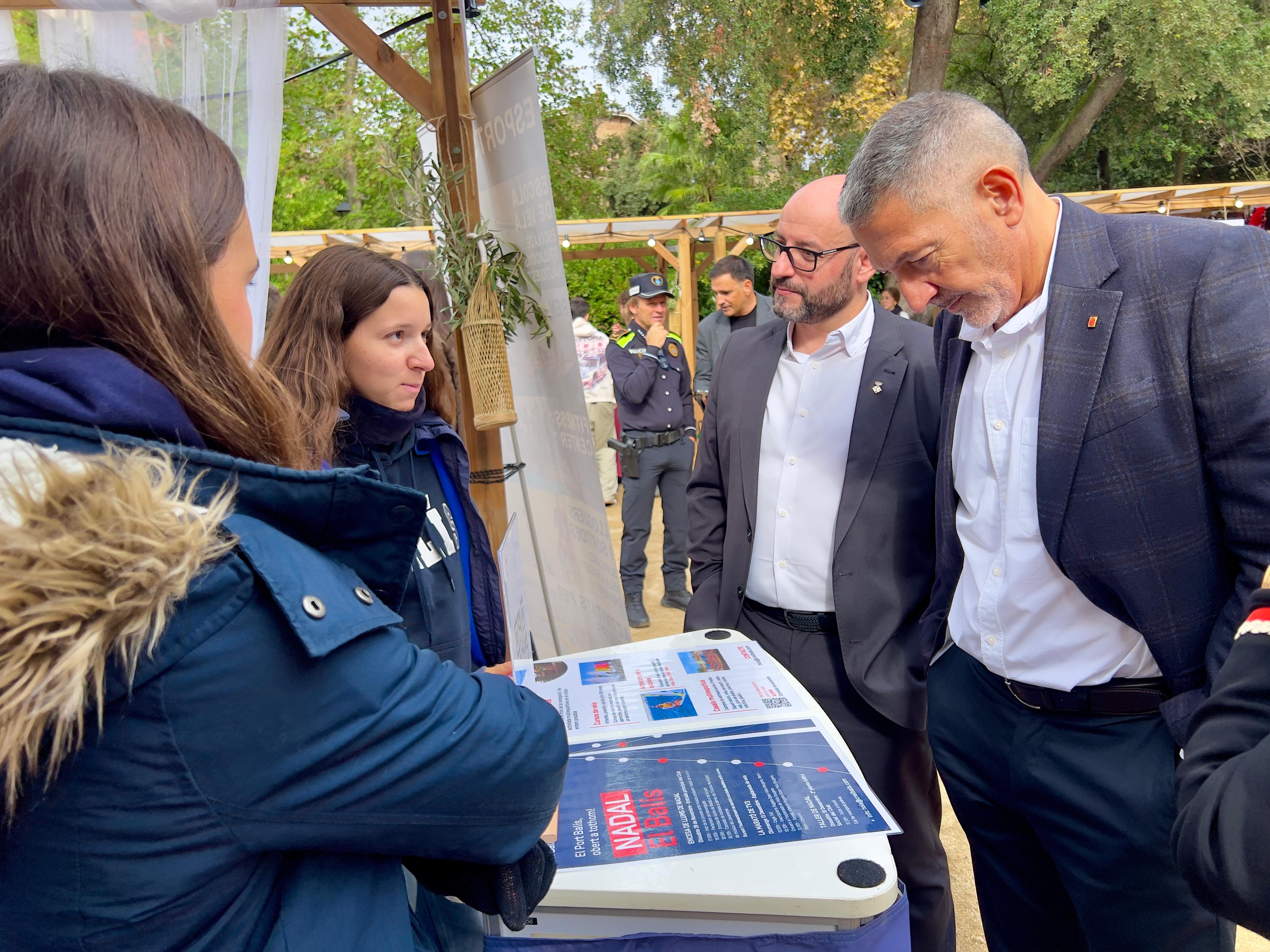 Salutaci� institucional als comer�os